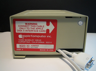 Illustration for article titled Mac Mini Inside an Apple Disk II Case